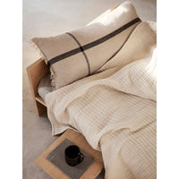 ferm-living-calm-cushion-long-camel-black-ferm-1102852853- (3)